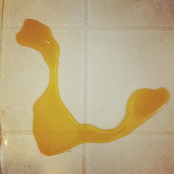 It's not what you think! Spilled hard wax on a bathroom tile floor= horrible to clean up.